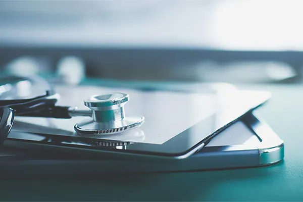 Functional-Diagnostic-Testing-Clinic Close up of a stethoscope lying on a tablet, representing advanced functional medicine testing offered by Morgan Burns, APRN in Central Florida.