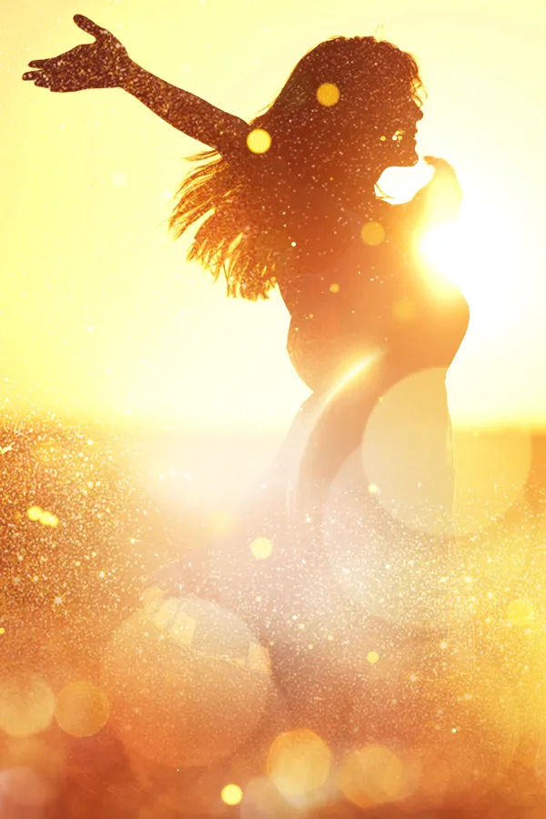 Neuro-Longevity-Peptides-Treatment A woman with outstretched arms in the sunset. Get Neuro-Longevity Peptides treatment from Morgan Burns, APRN in Central Florida.