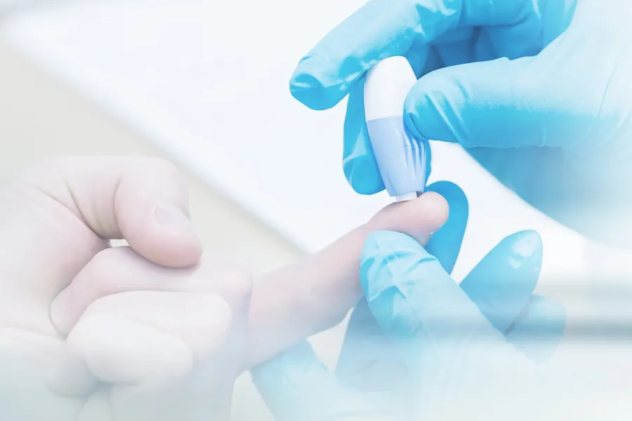 Type-2-Diabetes-Clinic Gloved hand performing a blood sugar check with a lancet. Morgan Burns, APRN offers expert Functional Medicine for Type 2 Diabetes care in Central Florida.